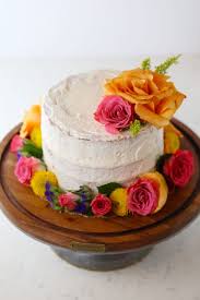 Make absolute romantic anniversary with the name on this anniversary cake. Naked Lemon Cake With Fresh Flowers Mom Loves Baking