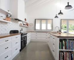 Polished Concrete Flooring Wood Countertop White Cabinets Concrete Kitchen Floor Concrete Kitchen Kitchen Flooring