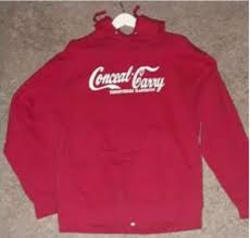 The TTABlog®: TTAB Sustains Coca-Cola's Dilution Claim Against  "Conceal-Carry Registered Handgun" Stylized Mark