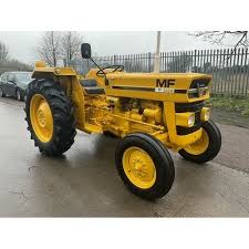 Image result for Yellow 1972 Tractor