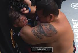 Female strawweight star fights enrmous male heavyweight in mismatch MMA bout