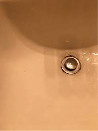 cosmetically repair a crack in a sink