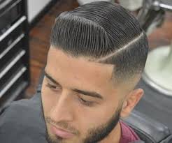 Men S Room Cancun Barbershop Fade Haircut Low Fade Haircut Haircuts For Men