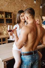 Sexy Couple Kissing On Kitchen Counter, Romantic Stock Photo, Picture and  Royalty Free Image. Image 131087976.