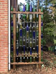 I want to backlight it with solar lights. Bottle Wall Garden Fence Makeover Crows Nest Arts
