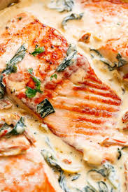 Creamy Garlic Butter Tuscan Salmon Or Trout Is Such An Incredible Recipe Restaurant Quality Salmon In Tuscan Salmon Recipe Salmon Dishes Easy Salmon Recipes