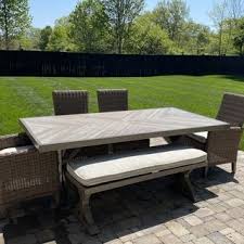 Beachcroft Dining Table With Umbrella Option Ashley Furniture Homestore In 2020 Outdoor Furniture Sets Patio Decor Indoor Outdoor Living