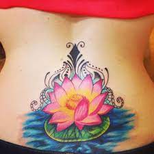 Pink Ink Lotus Flower In Water Tattoo On Girl Lower Back Flower Tattoo Jasmine Flower Tattoos Back Tattoos