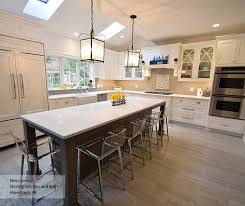 Here are some other benefits of wood cabinets White Inset Cabinets With A Gray Kitchen Island Masterbrand