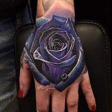 Amazing Artist Phil Garcia Philgarcia805 Blue Rose Hand Tattoo View 2 Philgarcia Sullen Sullenclothing Purple Rose Tattoos Rose Hand Tattoo Hand Tattoos