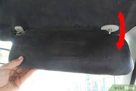 Turn the holder (a) 45 в° counterclockwise, and pull it down to remove it from the holder grommet (b). How To Remove A Sun Visor With Pictures Wikihow