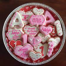 Blowing candles on the cake, cutting it and singing the birthday song are the only ways to celebrate a birthday these days. Valentine First Birthday Girl Sugar Cookies Valentines Birthday Party Valentines Day First Birthday Party Valentines Birthday