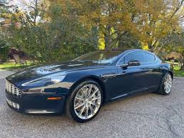 Image result for Midnight Blue 2012 Aston Martin