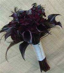 A wedding bouquet of purple and lavender fabric flowers and a neutral wrap will give a bright touch to your look. Why Should The Bride Pick A Black Wedding Bouquet Topweddingsites Com