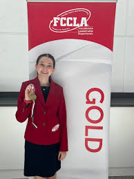 DCHS FCCLA chapter wins GOLD! Three members of the chapter attended the  National FCCLA Conference in Seattle, Washington along with chapter advisor  Michelle King and chaperone Jennifer Ebelhar. Evie Fuller and Kate