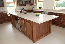 See how to make your island stand out as your kitchen's focal point with a distinctive paint color or wood finish. Kitchen Island Bases Kitchen Island Base Custom Kitchen Island Kitchen Design