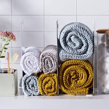 Neatly folded and stacked towels look much better than randomly. Towel Storage For Small Bathrooms 4 Towel Display Ideas