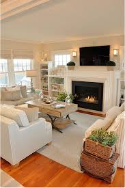 This timeless living room space features a fireplace with a carrara marble surround paired with a classic white mantel, yielding an enduring fireplace design. Like The Furniture Arrangement So It Focuses On The Fireplace And Tv But Easy Lay Out For Conventi Neutral Living Room Design Farm House Living Room New Homes