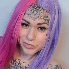 Image result for quirky pylon forehead tattoo