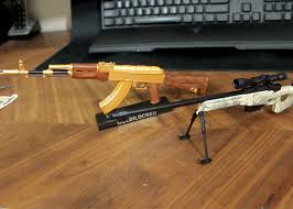 This is a gold ak 47 and, let's check out this fox flip. At23 Gold Ak L96 From Goatguns Popular Airsoft Welcome To The Airsoft World
