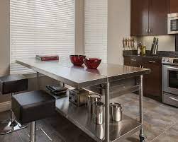 If you have less kitchen space to work with, consider a narrower kitchen island that the two most common materials for the base of a kitchen island or cart are metal and wood. 10 Stainless Steel Island Movable Ideas Stainless Steel Kitchen Island Stainless Steel Table New Kitchen