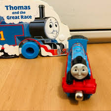 The great race is a mildly suspenseful, often amusing entry in the thomas collection of original dvds. Thomas Friends Toys Thomas And The Great Race Board Book And Toy Train Poshmark