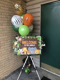 Jungle party ideas and diy decor these jungle themed ideas and diy decorations are perfect for a kids birthday party, a baby shower or any other summer fest you may have in mind! Setting The Scene From Outside Perfect Jungle Entrance Sign Jungleparty Safari Jungle Baby Shower Theme Baby Shower Safari Theme Baby Boy 1st Birthday Party