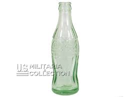 Pour l'occasion, une exposition samuelson ajoutera une teinte verte au verre. Bouteille Coca Cola 1943 Us Militaria Collection