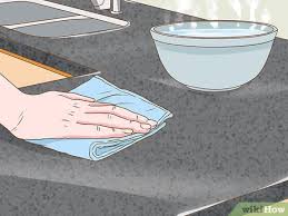 Ensure the area is undamaged, and proceed to mimic the technique along the water spots. 4 Ways To Clean Quartz Countertops Wikihow