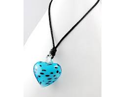 Shimmering in the light, it radiates beauty and serenity. Light Blue Spotted Glass Heart Necklace