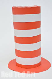 Glue the tabs to the inside of the red and white tube, so you can wear as a hat. A Quick Cat In The Hat Hat Red Ted Art Make Crafting With Kids Easy Fun