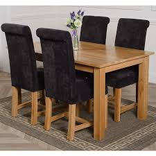 Once you've found your perfect dining room table and chairs why not take a look at our sideboards and dressers to. Oslo Medium Oak Dining Set With 4 Washington Black Fabric Chairs Oak Furniture King