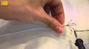 Use a plastic tool to scour any bits of adhesive residue from the rear case behind the cable. How To Repair Or Fix Earpods Replacing Jack Youtube