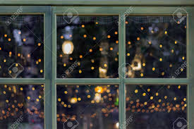 Check spelling or type a new query. Window With Green Wooden Frame On Front Of House Christmas Decoration With Garland Lights Stock Photo Picture And Royalty Free Image Image 110885121