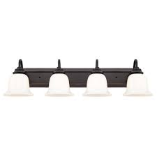 Patriot lighting® maggie led brushed nickel vanity light. Westinghouse Harwell 4 Light Amber Bronze Wall Mount Bath Light 6305100 The Home Depot Vanity Lighting Bathroom Vanity Lighting Glass Shades