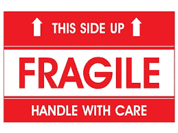 Woman sticking fragile mark to wrap at post office. 33 Fragile Label Pdf Labels For Your Ideas