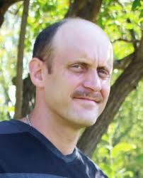 Charles L. “Chuck” Tracy