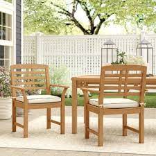 Chair in solid teak and rattan wood. Outdoor Teak Patio Dining Chairs You Ll Love In 2021 Wayfair