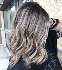 You can get this look by blending a peach blonde color as black hair highlights. 21 Chic Examples Of Black Hair With Blonde Highlights Stayglam