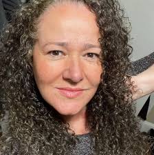 Who can recommend a reasonably priced photographer for a wedding in October?