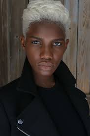 You might be confused by the. Blond White Bleached Hair Of African Decent Straightened Hair Male White Hair Men Hair Color Unique Character Inspiration