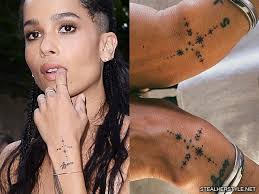 Tribal bracelet on his left wrist. 22 Protection Tattoo Photos Meanings Steal Her Style