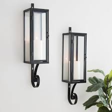Wall candle sconces are those tarnished brass things that have hung in your grandma's living room for centuries. Black Metal Collin Wall Sconces Set Of 2 Kirklands Wall Sconces Bedroom Wall Sconces Living Room Wall Candle Holders Living Room