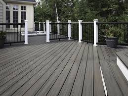 black and white and gray all over a sunken hot tub blends perfectly against the gray decking boards decks backyard patio design building a deck