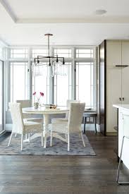 Anna alfaro chose butcher block countertops because they flowed so well with the wooden dining room table, and contrasted beautifully against the industrial metal chairs. Modern White Kitchen Modern Kuche Toronto Von Croma Design Inc Houzz