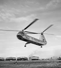 The 2 engines are mounted either side of the rear fin on top of the fuselage. 1950s Photograph Air Force Twin Rotor Helicopter By H Armstrong Roberts Classicstock Helicopter Military Helicopter Air Force
