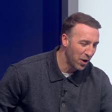 Justin Kluivert strikes the ball into the far corner