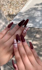 Inside, check out the burgundy nail looks we're loving at the moment. Remake Red Wedding Nails Fall Acrylic Nails Nails Design With Rhinestones