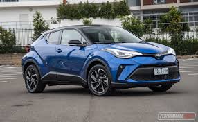 Bring a familiar interface along for the ride. 2020 Toyota C Hr Hybrid Review Video Performancedrive