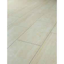 Laminate floors are designed to look, feel and even sound like real hardwood without the hardwood price tag the wide range of laminate flooring materials on the market can seem overwhelming Wickes Travertine Tile Effect Laminate Flooring